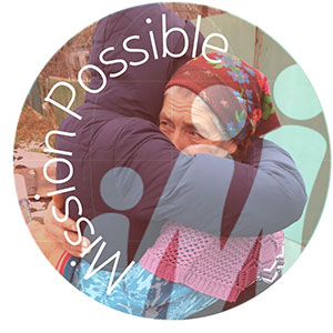 A circular image of an elderly woman being hugged, with the words Mission Possible overlaid